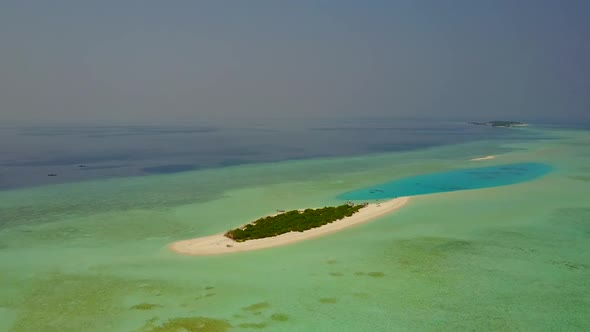 Drone view nature of bay beach voyage by blue sea with sand background