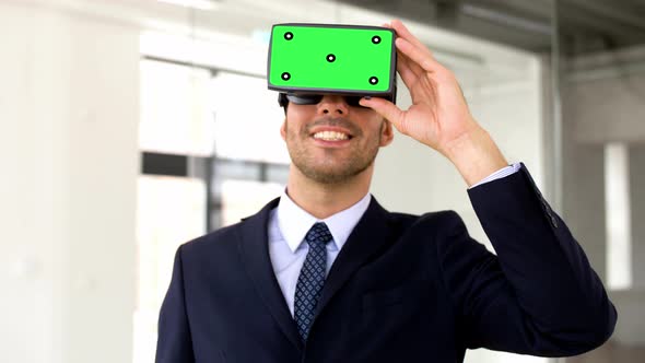 Businessman with Green Screen on Vr Headset