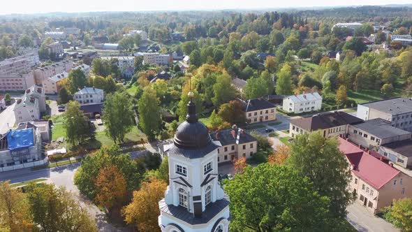 Latvia, Aluksne Old Lutheran Church With Golden Cock Statue on the Top of Tower, Aerial Dron 4K Shot