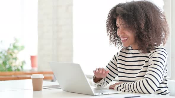 African Woman Doing Video Chat on Laptop 