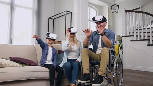 Likable Confident Smart Modern Family which Applying Virtual Reality Headset 