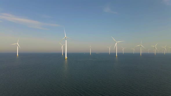 Wind Turbines in the Early Morning Wind Mill Park in the Netherlands