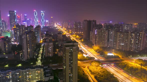 Urban timelapse of China city with traffic of cars and beautiful skyscrapers with business centers. 