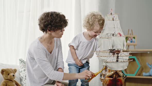 Family of Two Playing with Toys