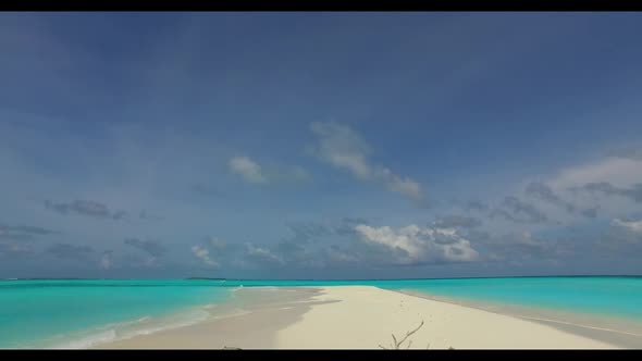 Aerial top down abstract of paradise lagoon beach time by blue green ocean and bright sand backgroun