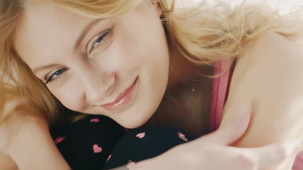 Blue Eyes of a Young Woman Looking Into the Camera