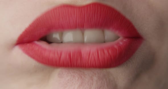 Blowing Through The Red Lips And Wobbling And Shaking A Macro Shot Of Female