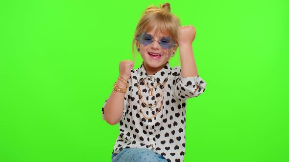 Little Blonde Kid Child Girl Celebrate Success Win Rejoices Doing Winner Gesture Say Yes Dancing