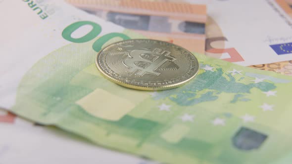 Golden Bitcoin Lies on Euro Banknotes