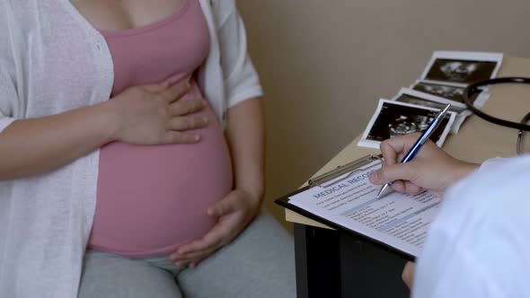 Pregnant Woman and Gynecologist Doctor at Hospital