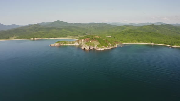 Drone View of the Rocks and Grottoes of Cape Kuzmin in the Gulf of Vladimir