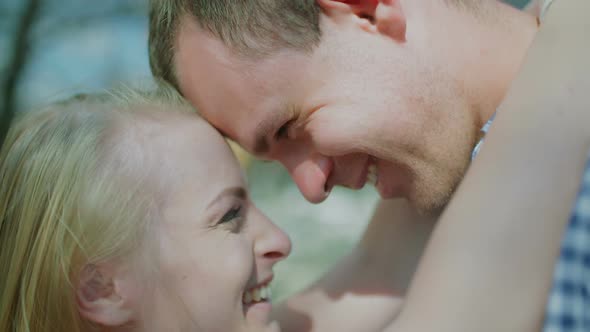 Close Up of Positive Loving Couple Smiling