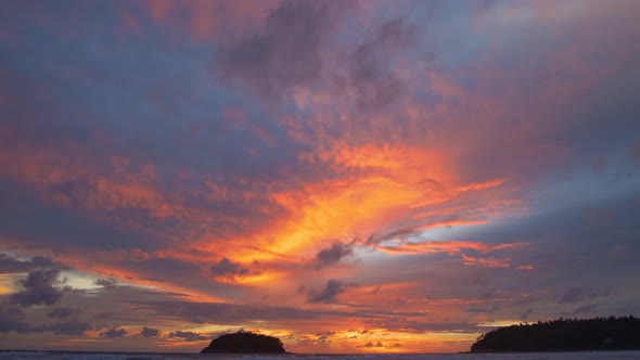 Beautiful Orange Cloud In Sunset Over Pu Island At Kata Beach.