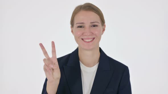 Young Businesswoman Showing Victory Sign on White Background