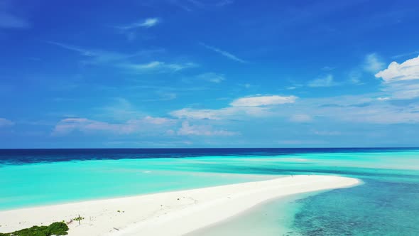 Wide overhead abstract shot of a paradise sunny white sand beach and aqua turquoise water background