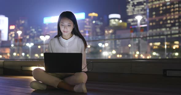 Business Woman Working on Laptop Computer at Outdoor