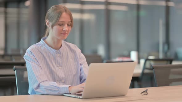 Young Woman Closing Laptop Standing Up Going Away