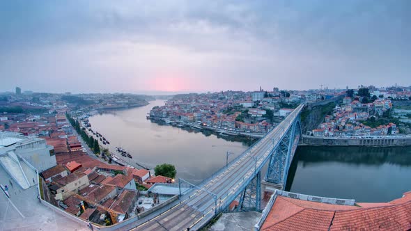 Day To Night View of the Historic City of Porto Portugal Timelapse with the Dom Luiz Bridge