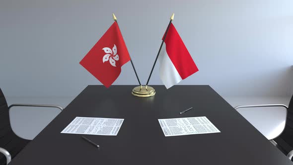 Flags of Hong Kong and Indonesia and Papers