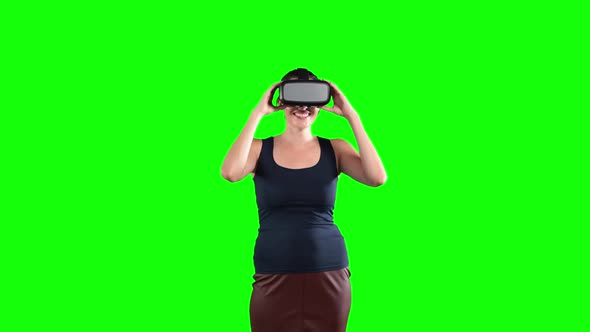 Animation of a Caucasian woman wearing 3D goggles in a green background