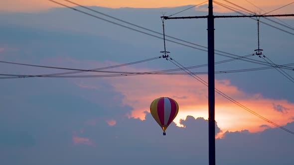 Air Balloon Flying Against Sunset Background, Cloudy Sky, Unusual Journey