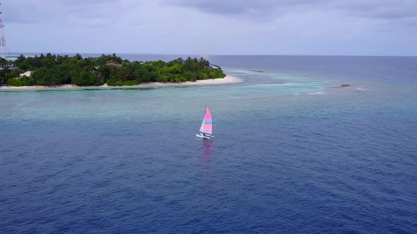 Drone aerial seascape of lagoon beach time by blue ocean and sand background