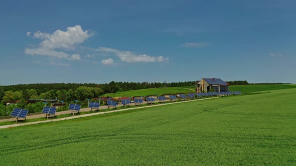 Innovative solar panels on field. Blue sunny batteries collect clean energy from the sun 