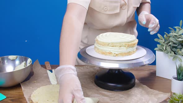 Small Business and Hobby Concept. Pastry Chef, Makes a Cake