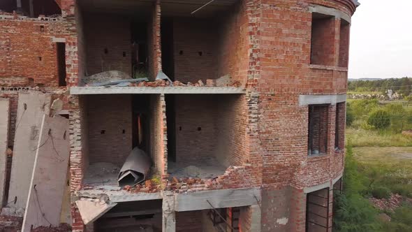 Aerial view of an old ruined building after earthquake, A collapsed brick house