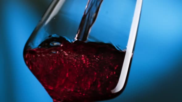 Red Wine Pouring From Bottle