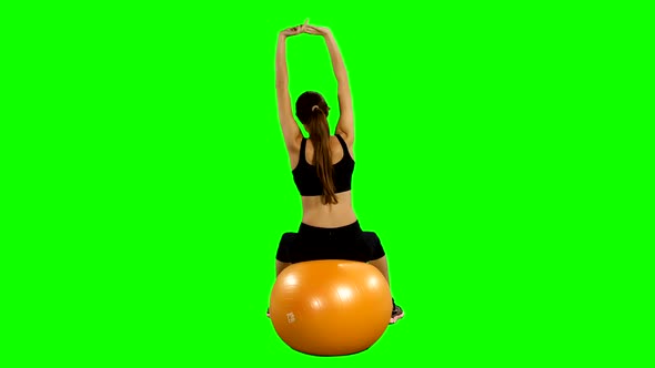 Woman Doing Fitness Exercise with Fitness-ball, Gym, Green Screen