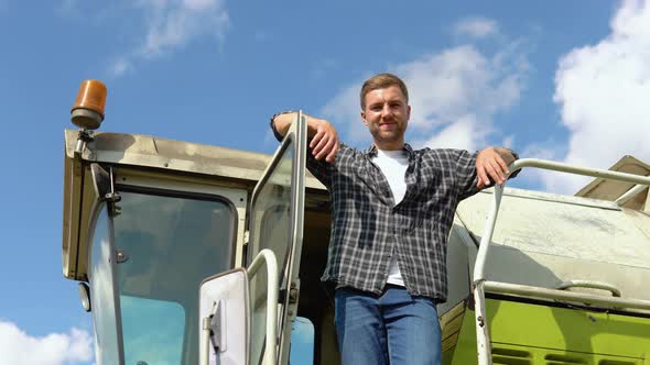 Tired Farmer Working at Grain Farm