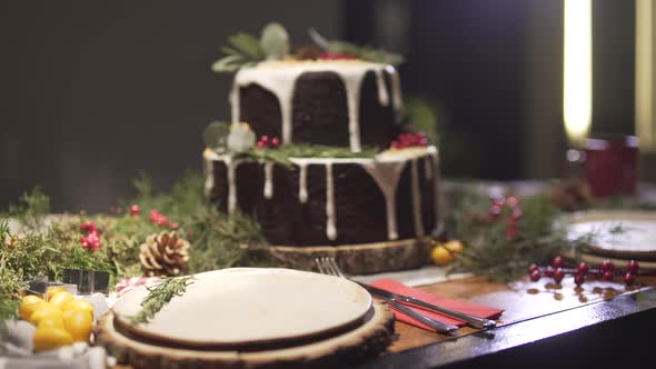 delicious Christmas dinner table gingerbread cake in New Year eve cozy decoration festive atmosphere