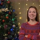 Portrait Of Young Woman Happy and Excited Standing During Christmas Tree - VideoHive Item for Sale