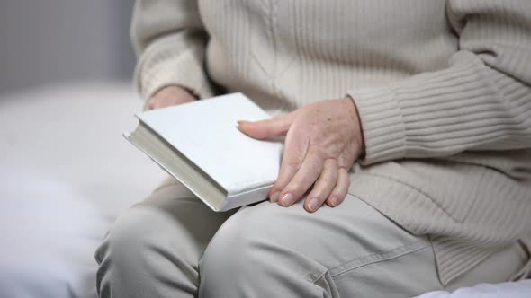 Elderly Lady Wearing Eyeglasses and Reading Book, Vision Problems, Health Care