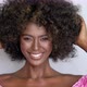 Smiling Black Woman with Curly Hair - VideoHive Item for Sale
