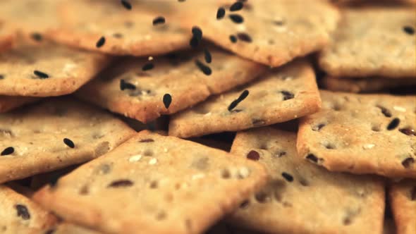 Super Slow Motion on the Cracker Falling Sesame Seeds