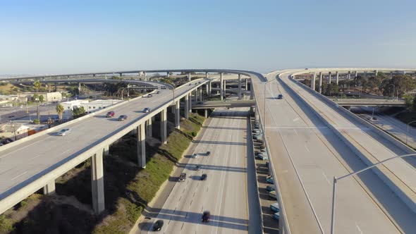 Not High Aerial View of the Multi-level Road Junction in Los Angeles and Traffic on It.