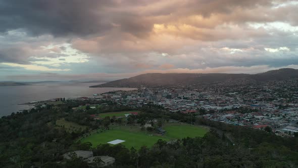 Sunset from Queen's Domain over Hobart with Mt Wellington, Tasmania Aerial Drone 4K