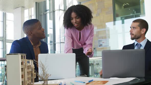 Young business people talking in a modern office