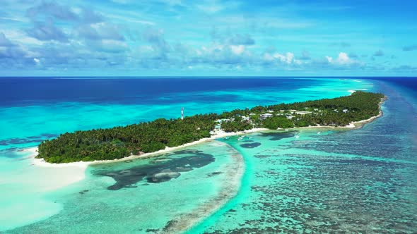 Aerial landscape of exotic coastline beach lifestyle by clear lagoon and white sand background of ad
