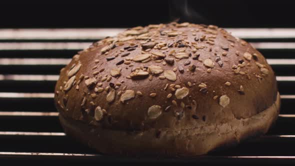 Round loaf of bread to roast on fire