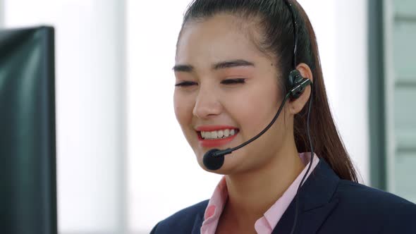 Business People Wearing Headset Working in Office