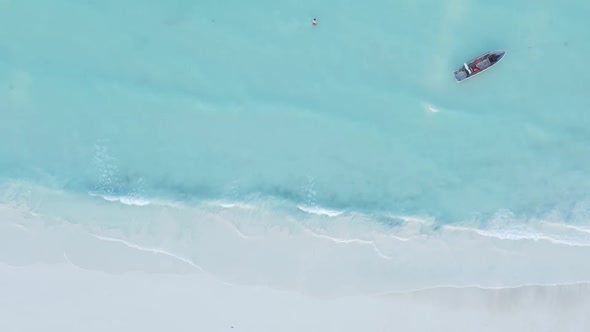 Vertical Video Boats in the Ocean Near the Coast of Zanzibar Tanzania Aerial View