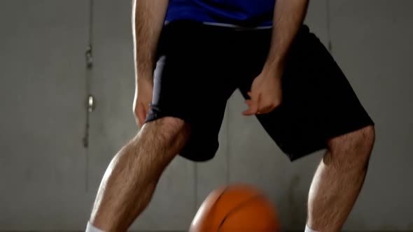 Male basketball player playing in the court 4k