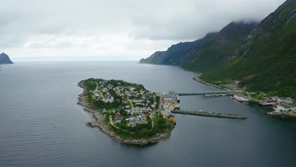 Flying Towards the Husoy Fishing Village on the Senja Island Norway