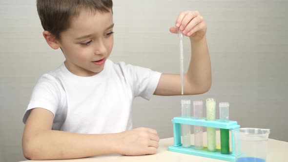 A Happy Child Learns the Reactions of Chemicals