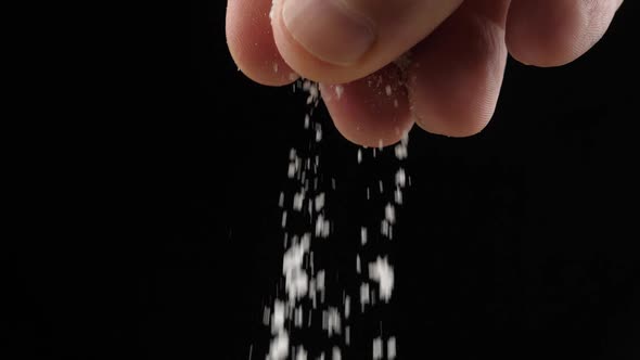 Chef adds salt to the dish, cooking in slow motion, cooking food