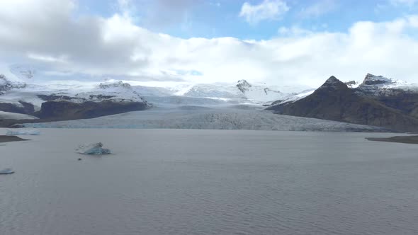 Wide Aerial Dolly Shot of a Glacial Lagoon.