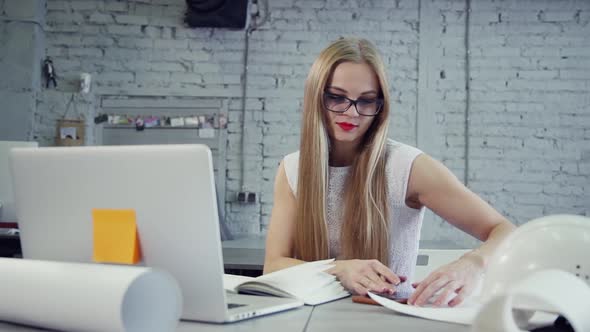 Supervisor Woman Is Sitting at Table and Discussing Online Through Conference Call